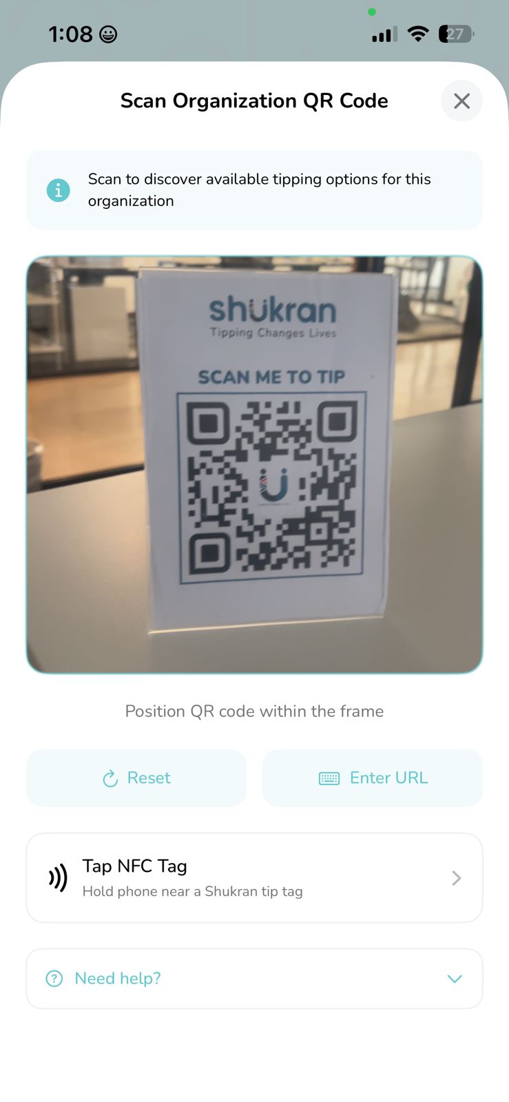 Shukran mobile app scanning a QR code